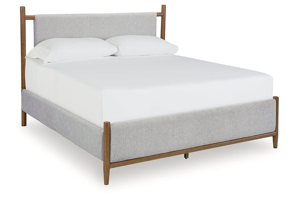 Lyncott Brown California King Upholstered Panel Bed
