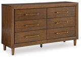 Lyncott California King Upholstered Bed with Dresser and 2 Nightstands in Brown from Ashley - Luna Furniture