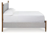 Lyncott Queen Upholstered Bed with Mirrored Dresser, Chest and 2 Nightstands in Brown from Ashley - Luna Furniture