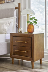 Lyncott Queen Upholstered Bed with Mirrored Dresser, Chest and Nightstand in Brown from Ashley - Luna Furniture