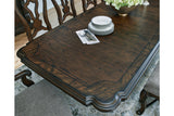 Maylee Dark Brown Dining Extension Table from Ashley - Luna Furniture