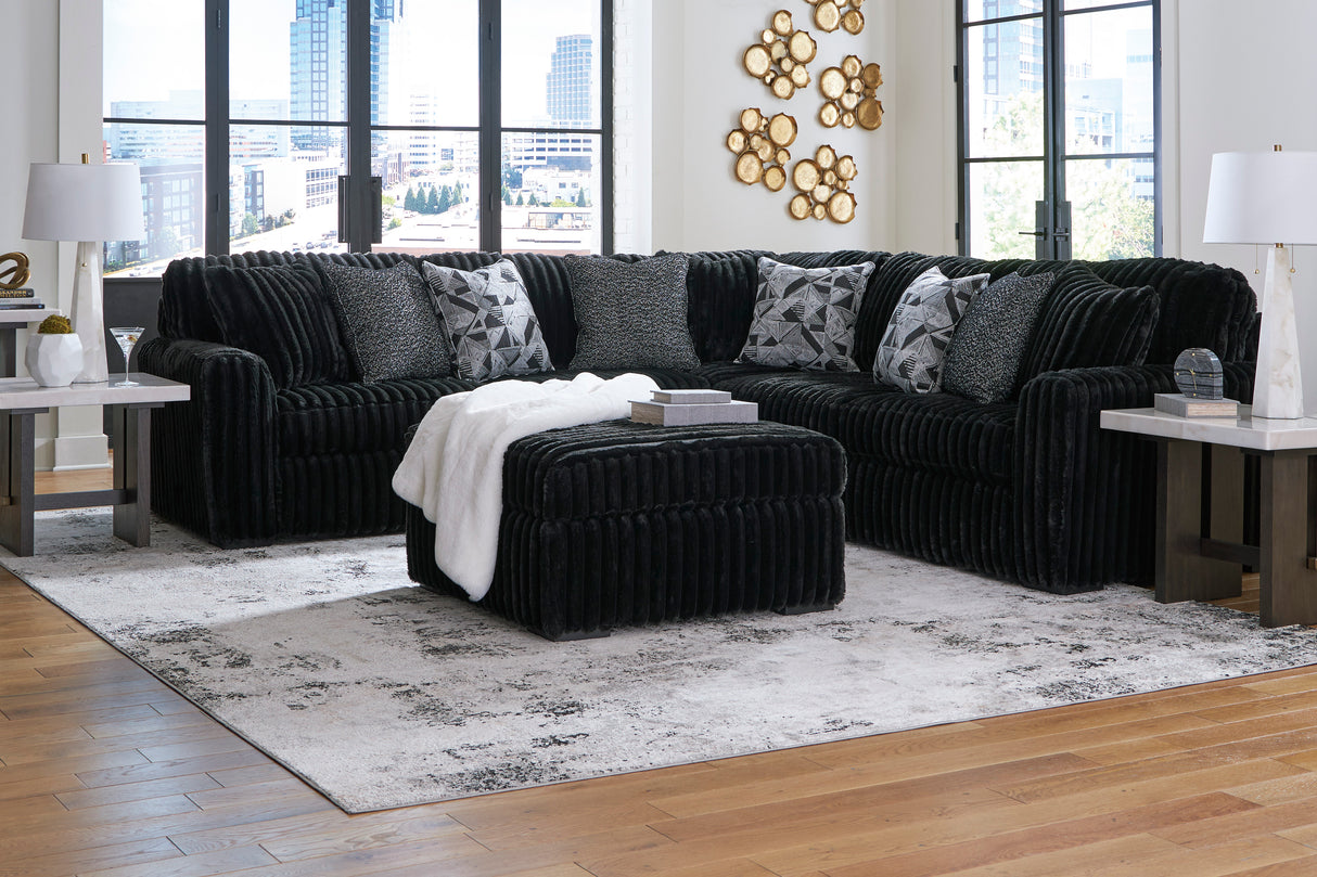 Midnight-Madness 3-Piece Sectional with Ottoman in Onyx from Ashley - Luna Furniture