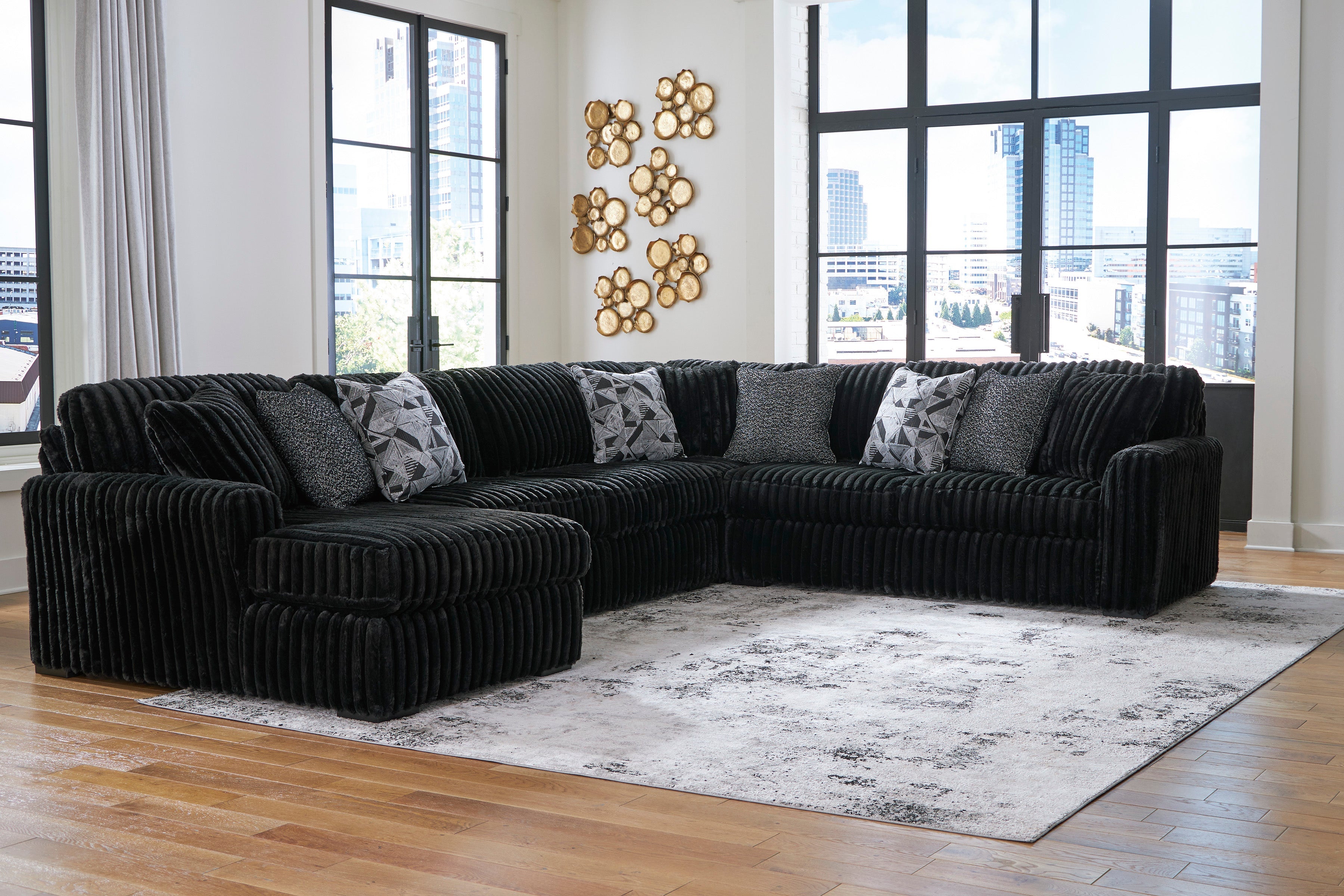 Midnight-Madness 4-Piece Sectional with Ottoman in Onyx – Luna