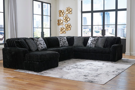 Midnight-Madness 4-Piece Sectional with Ottoman in Onyx from Ashley - Luna Furniture