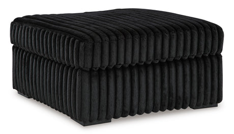 Midnight-Madness 4-Piece Sectional with Ottoman in Onyx from Ashley - Luna Furniture