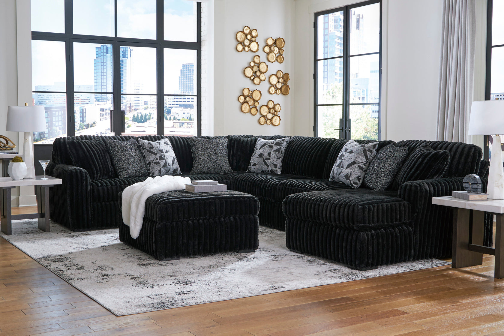 Midnight-Madness 4-Piece Sectional with Ottoman in Onyx from Ashley - Luna Furniture