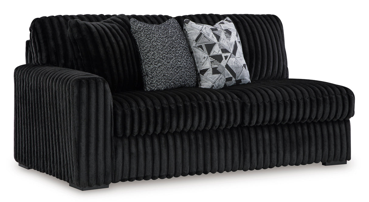 Midnight-Madness 4-Piece Sectional with Ottoman in Onyx from Ashley - Luna Furniture