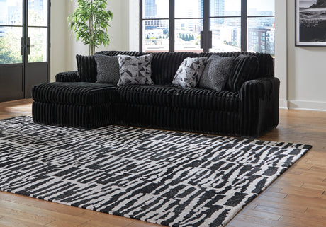 Midnight-Madness Onyx LAF Chase Sectional and Ottoman from Ashley - Luna Furniture