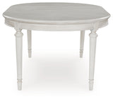 Montelaine Antique White Dining Extension Table from Ashley - Luna Furniture