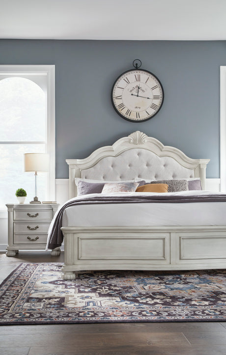 Montelaine Antique White King Upholstered Panel Bed from Ashley - Luna Furniture