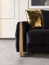 Florence Black sofa, close-up of gold sequin pillow and gold arm trim