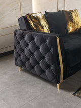 Florence Black sofa side detail, quilted black velvet with gold-trimmed arm edge