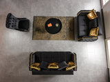 Florence Black sofa detail, gold side trim and velvet arm, side close-up