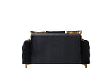 Florence Black sofa front view, black velvet seat with gold trim, isolated studio shot