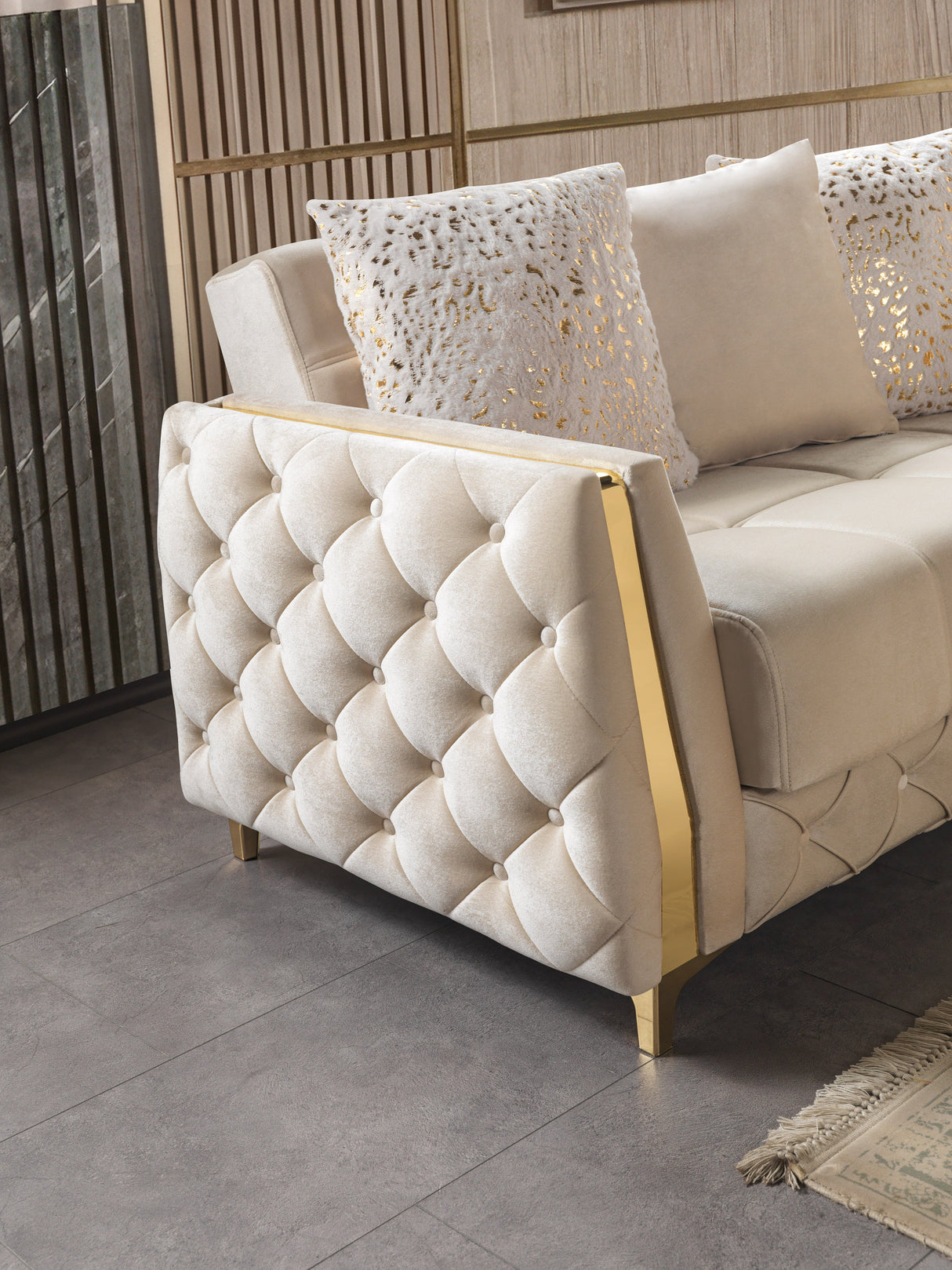 Florence Ivory sofa, ivory velvet with quilted side panel and gold trim, angled detail