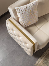Florence Ivory convertible sofa, tufted side panel and gold trim, angled detail