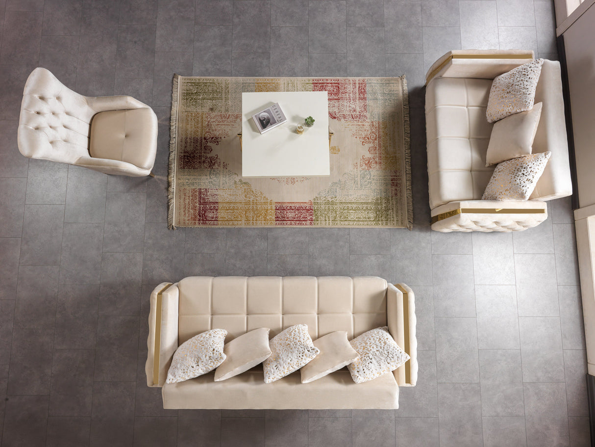 Florence Ivory sofa, ivory velvet with gold trim and quilted side, close-up side view