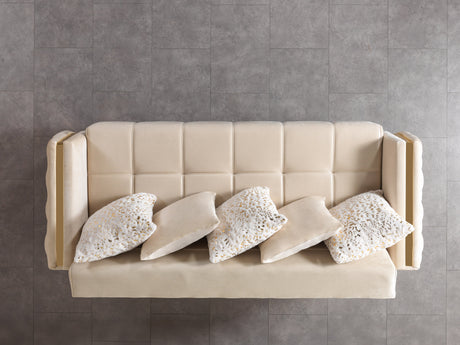 Florence Ivory sofa, ivory velvet with gold accents and tufted side panel, close-up
