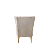 Florence Ivory accent chair, side view showing wingback shape and gold legs