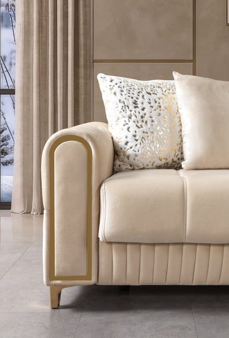 Sandra Ivory Loveseat, gold-trimmed armrest and patterned accent pillow, close-up