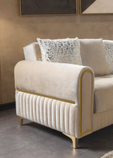Sandra Ivory Sofa, velvet arm and channel base detail, side close-up