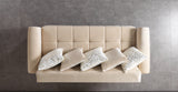 Sandra Ivory Sofa, tufted front and gold trim, straight-on view