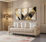 Sandra Ivory Velvet Convertible Sofa, three-quarter view with gold trim and pleated base