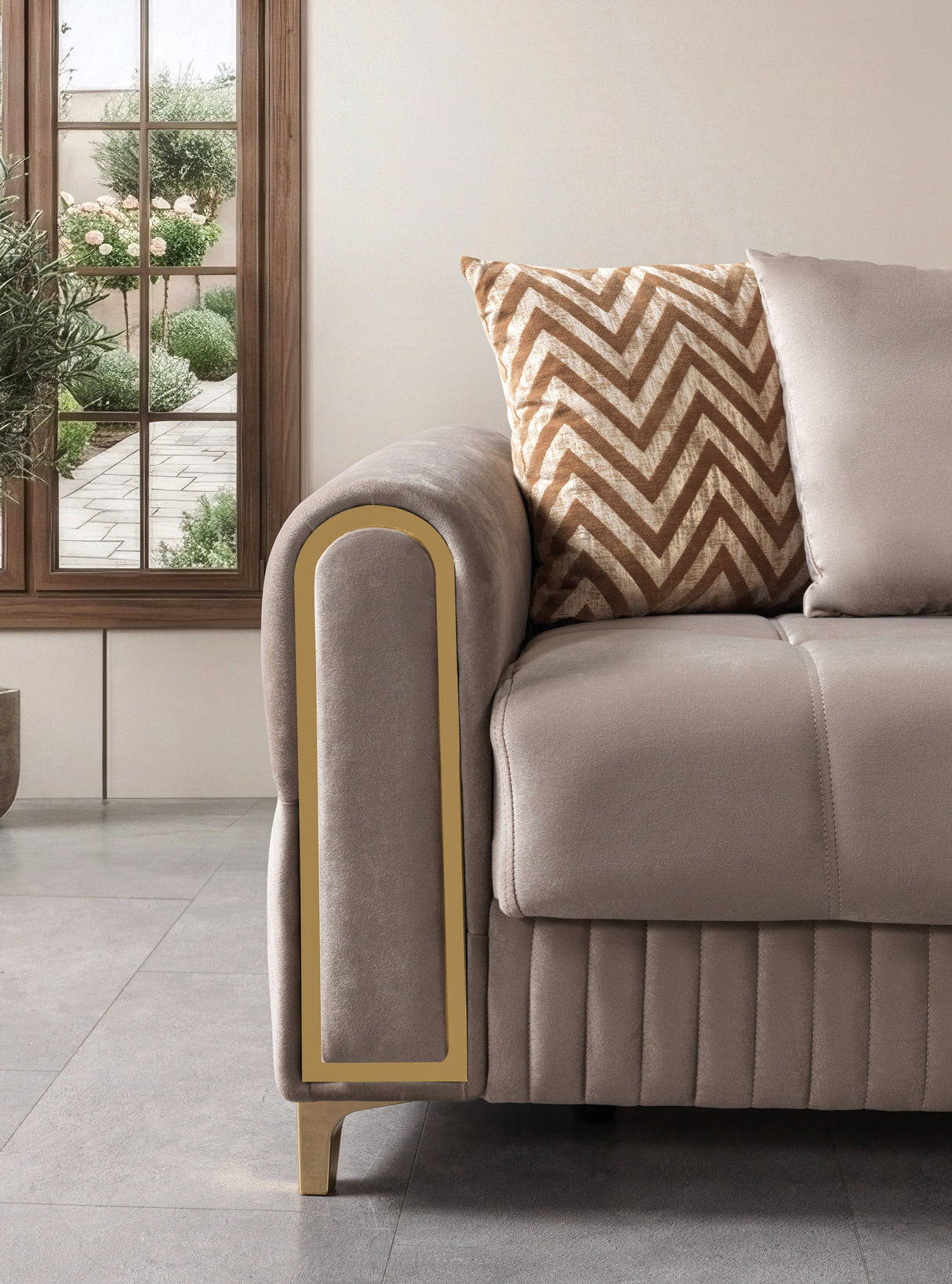 Sandra Coffee sofa, close-up side arm with gold trim and velvet texture