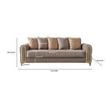 Sandra Coffee sofa, side profile, tufted base and gold trim on white background