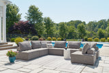 Bree Zee 8-Piece Outdoor Sectional with Lounge Chair in Brown from Ashley Furniture - Luna Furniture