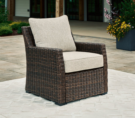 Brook Ranch Brown Outdoor Sectional Set with Lounge Chair and Coffee Table from Ashley - Luna Furniture
