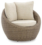 DANSON Beige Swivel Lounge with Cushion from Ashley Furniture - Luna Furniture