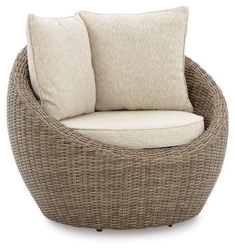 DANSON Beige Swivel Lounge with Cushion from Ashley - Luna Furniture