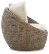 DANSON Beige Swivel Lounge with Cushion from Ashley Furniture - Luna Furniture