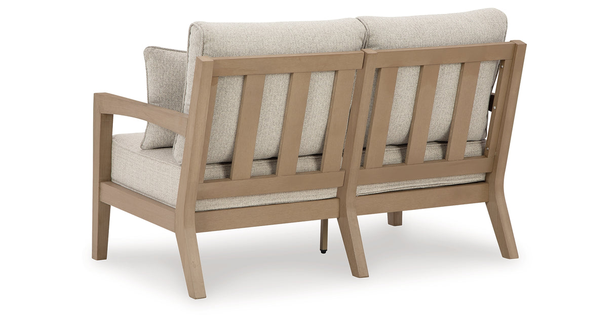 Hallow Creek Driftwood Outdoor Loveseat with Cushion from Ashley Furniture - Luna Furniture