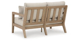 Hallow Creek Driftwood Outdoor Loveseat with Cushion from Ashley Furniture - Luna Furniture