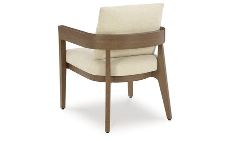 Serene Bay Dark Brown/White Outdoor Dining Arm Chair with Cushion from Ashley Furniture - Luna Furniture