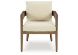 Serene Bay Dark Brown/White Outdoor Dining Arm Chair with Cushion from Ashley Furniture - Luna Furniture