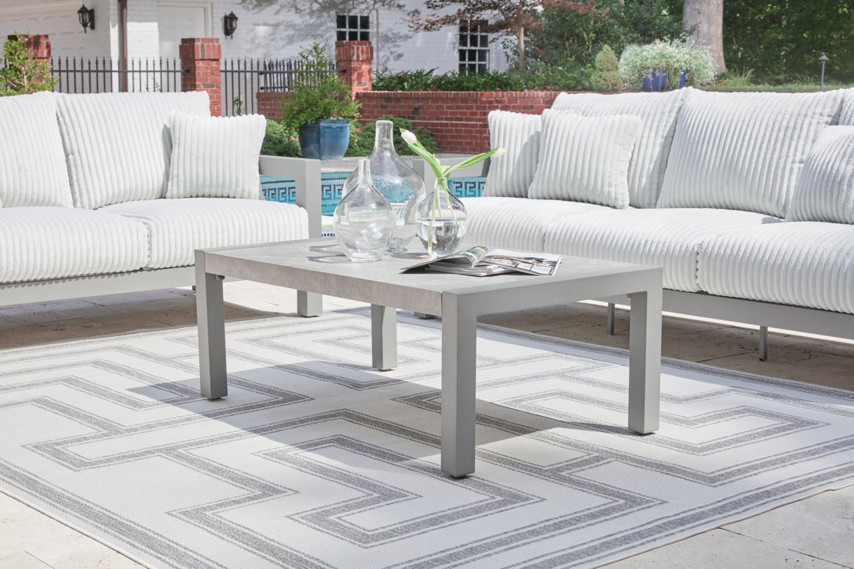 Hurley Park Outdoor Sofa and Loveseat with Coffee Table in Gray from Ashley Furniture - Luna Furniture