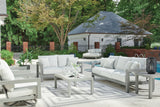 Hurley Park Outdoor Sofa and Loveseat with Coffee Table and 2 End Tables in Gray from Ashley Furniture - Luna Furniture