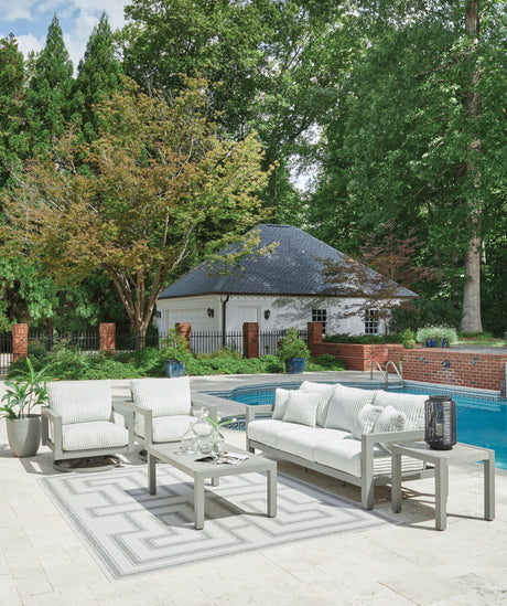 Hurley Park Gray Outdoor Sofa, 2 Lounge Chairs and Coffee Table from Ashley Furniture - Luna Furniture