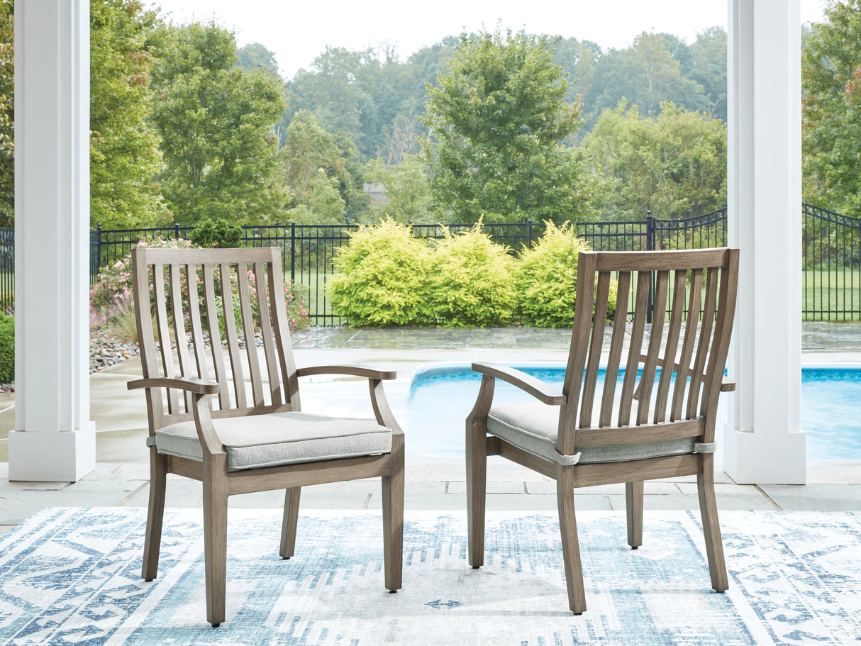Rainier Ranch Brown/Beige Outdoor Arm Chair with Cushion (Set of 2) from Ashley Furniture - Luna Furniture