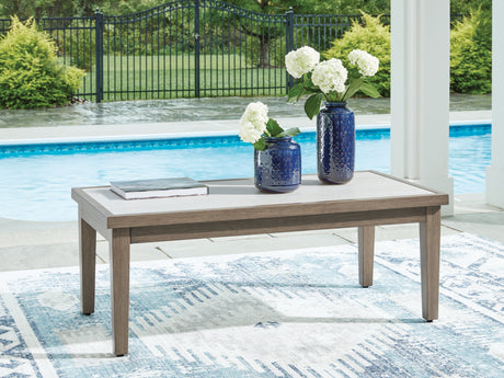 Rainier Ranch Brown/Beige Outdoor Coffee Table from Ashley Furniture - Luna Furniture