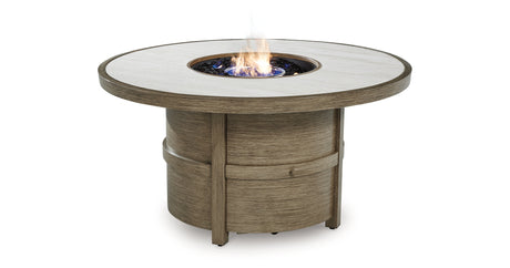 Rainier Ranch Beige Fire Pit Table from Ashley Furniture - Luna Furniture