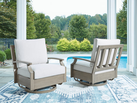 Rainier Ranch Brown/Beige Outdoor Swivel Glider Chair with Cushion from Ashley Furniture - Luna Furniture
