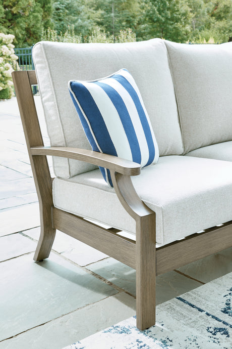 Rainier Ranch Brown/Beige Outdoor Loveseat with Cushion from Ashley Furniture - Luna Furniture