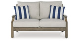 Rainier Ranch Outdoor Sofa and Loveseat with Coffee Table in Brown/Beige from Ashley Furniture - Luna Furniture