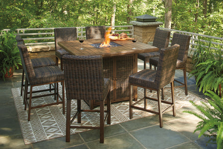 Paradise Trail Medium Brown Outdoor Counter Height Dining Table with 6 Barstools from Ashley Furniture - Luna Furniture