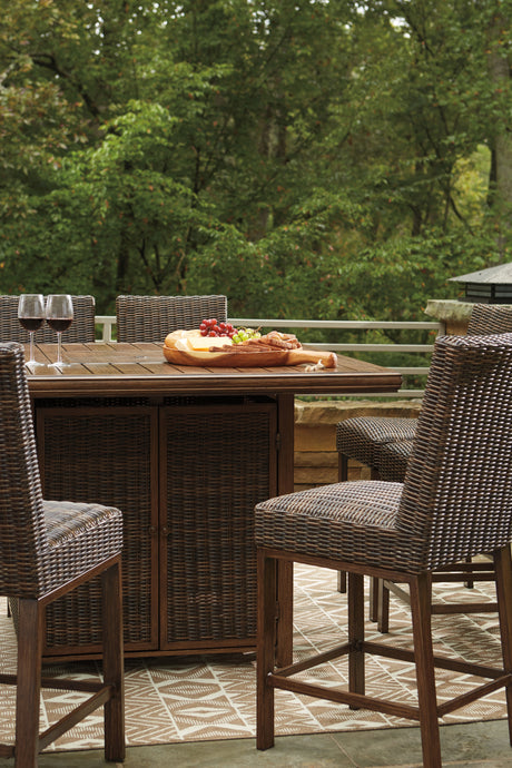 Paradise Trail Medium Brown Outdoor Counter Height Dining Table with 6 Barstools from Ashley Furniture - Luna Furniture