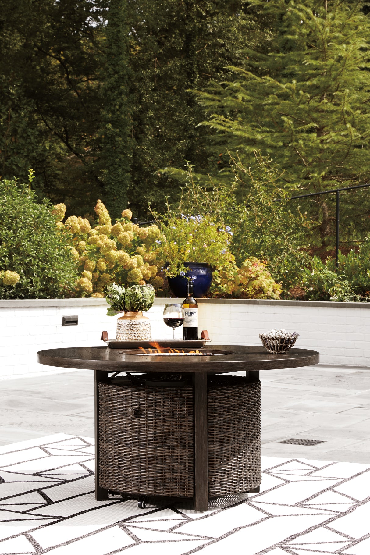 Paradise Trail Medium Brown Outdoor Fire Pit Table with 4 Lounge Chairs from Ashley Furniture - Luna Furniture